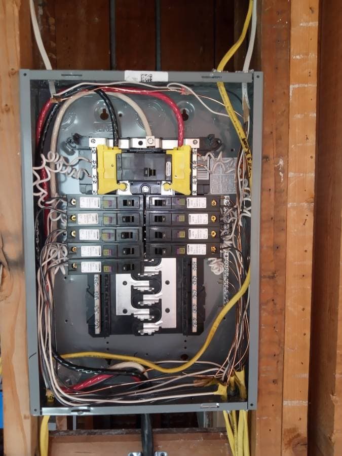 picture of a circuit breaker being installed in a home